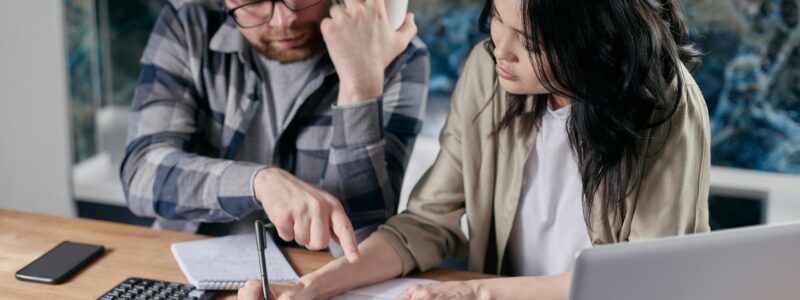 Free couple calculating al their bills stock photo